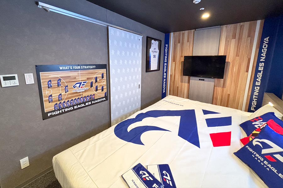 ベッドカバーやクッションカバー等の布で統一感を演出