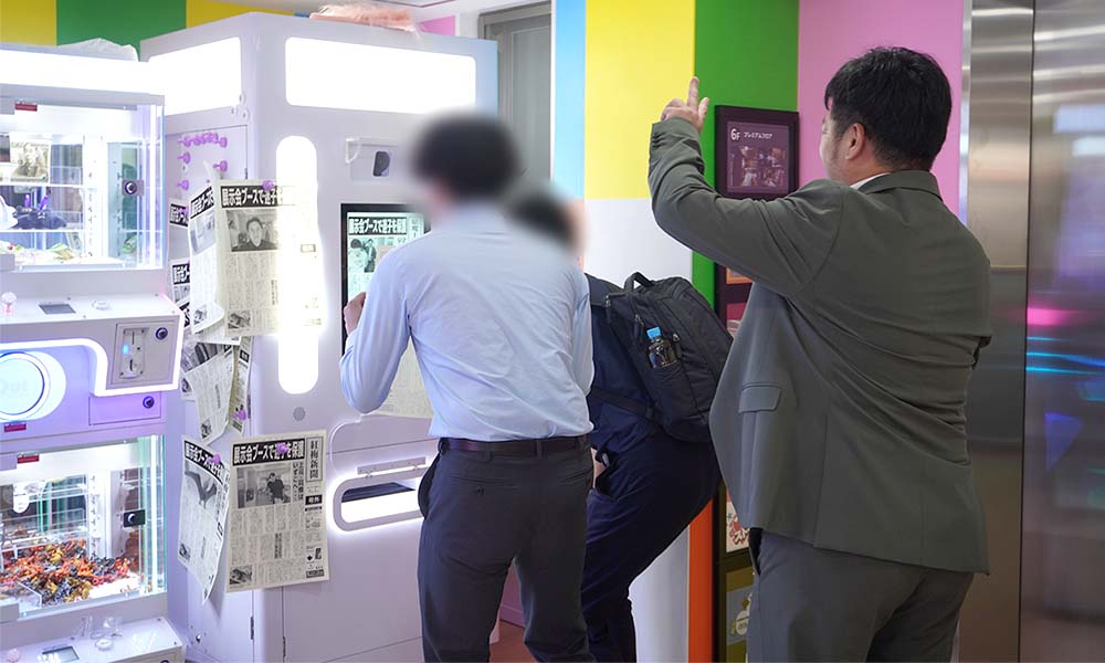 4階：記念になる新聞風プリント機も大人気